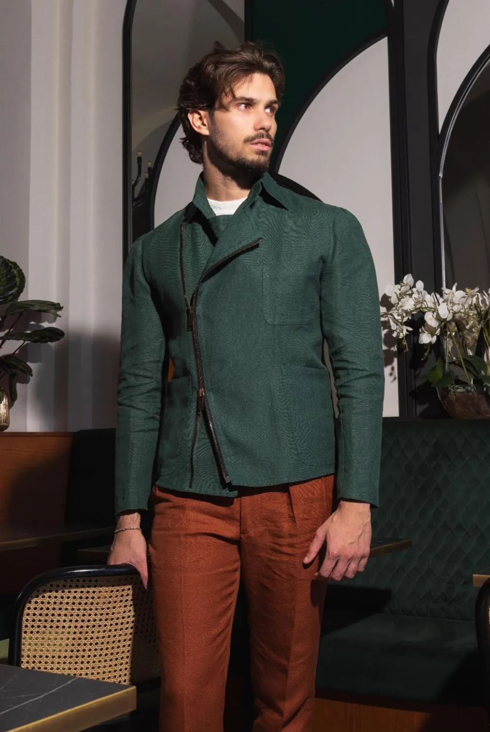 Green Vibe jacket with rust trousers